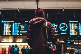 Passengers with suitcases in front of Belgrade Nikola Tesla airport